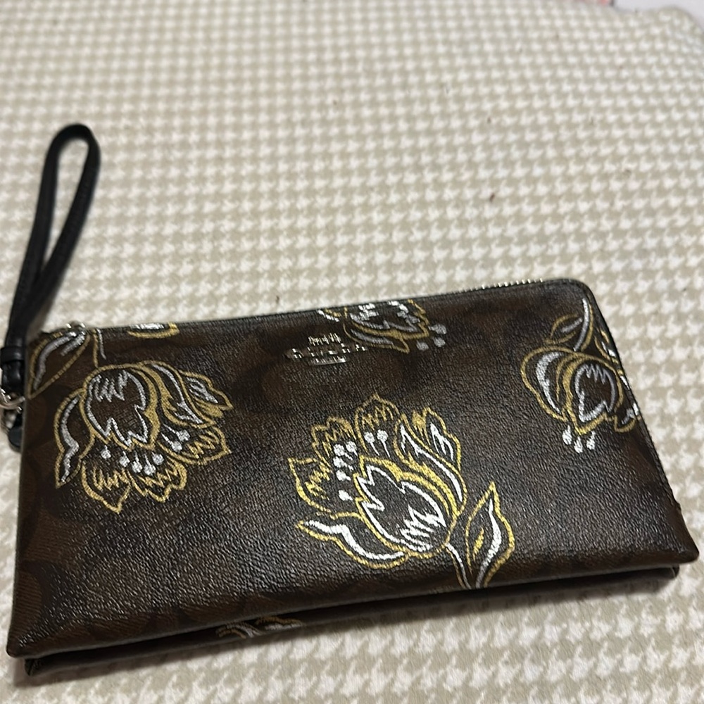 Brown multi colored double zip wallet wristlet used twice but in good condition
